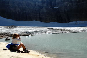 Travel Planning includes remembering the binoculars / Studying Glacier w/binoculars - (c) 2006 Ted Grellner